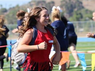 A student running outside