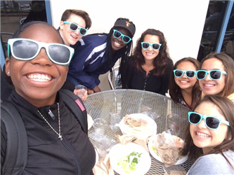 Students with Blue Sunglasses eating food
